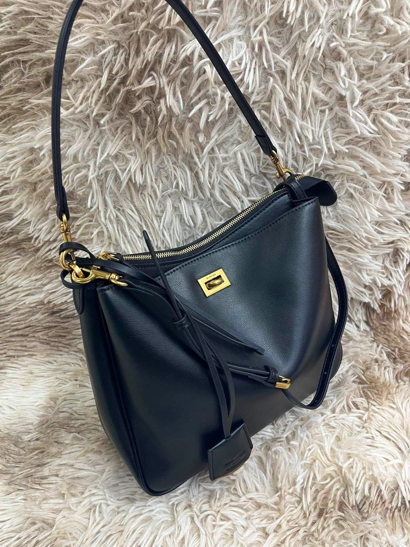 Preloved Balenciaga Rodeo Small (Category: Shoulder Bags) located in Manila. Submitted by bagsandshoesmanymore (Listing ID 1452592761, Image 2). Description: Preloved Rodeo Small Handbag Size 27cm Removable shoulder strap One handle Age-gold hardware Turn lock closure Nappa lambskin lining Made in Italy.