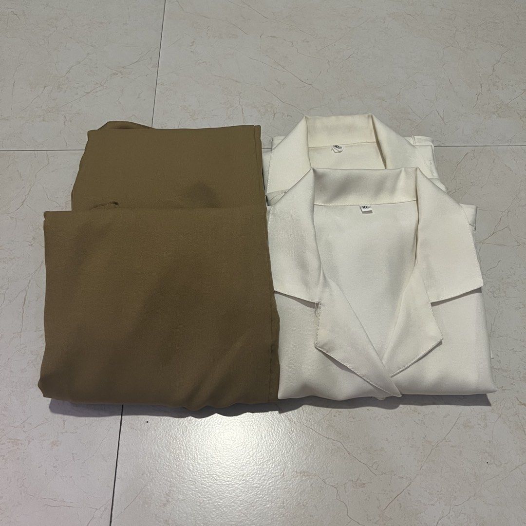 [Preloved] UST AMV Type A Female Uniform XL Set (Category: Sets or Coordinates) located in Las Pinas. Submitted by franczesca.calma (Listing ID 1452659557, Image 1). Description: – Sold as a set – Used for 2 semesters – Includes 2 blouses and pants (1 with broken zipper) – Measurements indicated in the pictures – Also available in a 3XL (please check my profile).