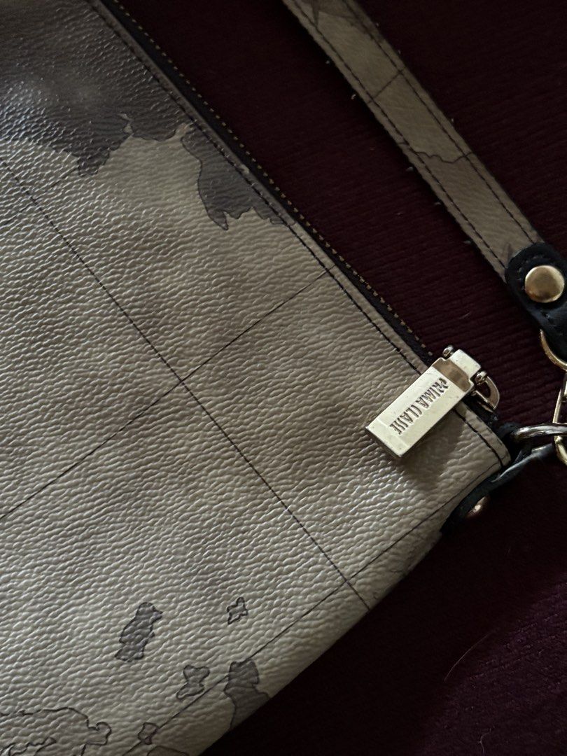 Prima Classe Map Print Clutch Bag (Category: Luxury Bags & Wallets) located in Manila. Submitted by librastudio (Listing ID 1452568438, Image 3). Description: - Authentic Prima Classe bag - Classic map print design - Elegant gold hardware details .