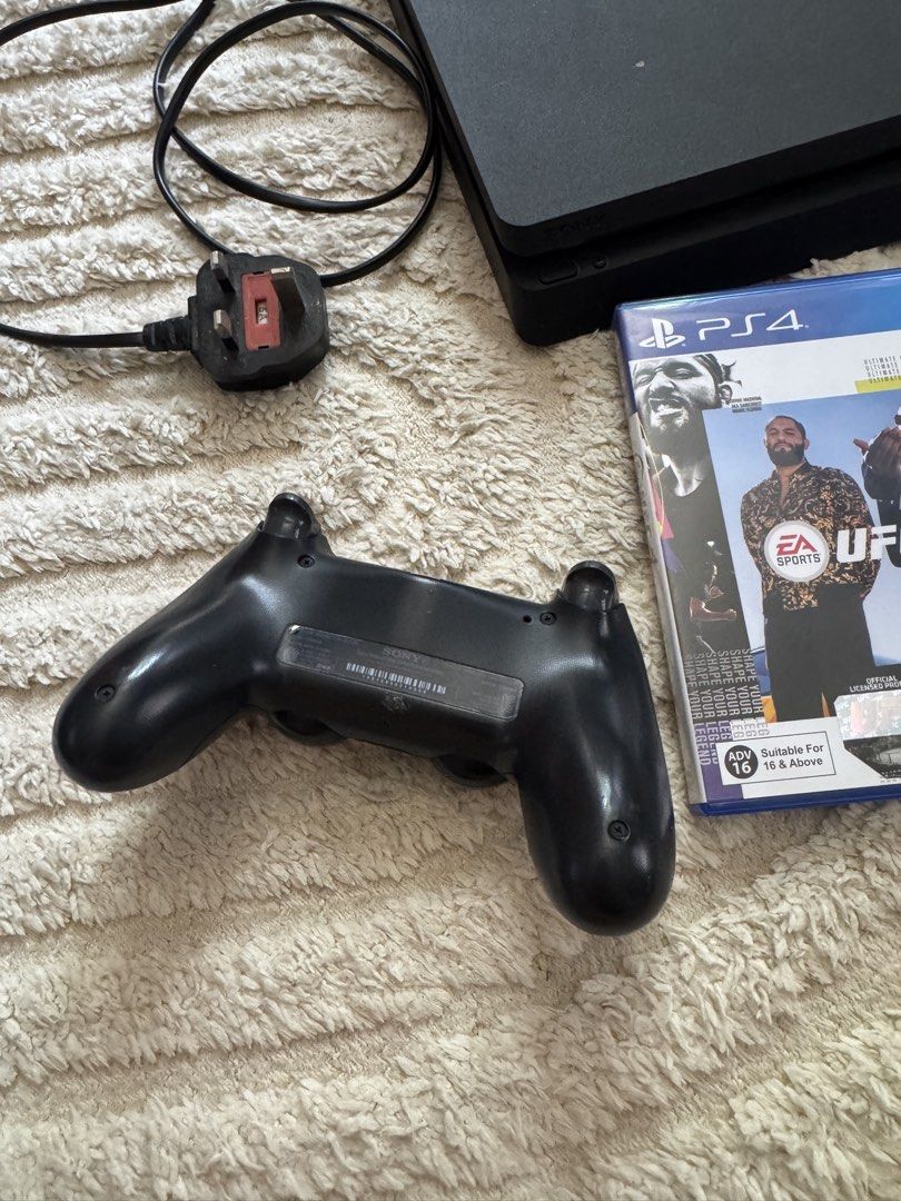 PS4 Slim Console with 3 Games and Controller (Category: PlayStation) located in Pasig City. Submitted by springcleaning.mnl (Listing ID 1452592794, Image 2). Description: - PlayStation 4 Slim Console - 1 DualShock 4 Controller - Power Cable - Games: NBA 2K20, NBA 2K21, UFC 4 - All items in good working condition - Ready for immediate play!.