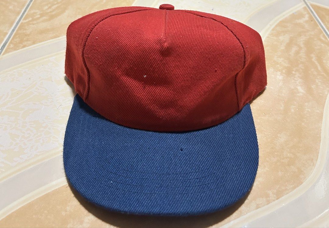 Red and Blue Snapback Cap (Category: Caps & Hats) located in Manila. Submitted by dcoolest (Listing ID 1452651742, Image 1). Description: - Classic snapback cap - Red top with blue brim - Adjustable strap for a custom fit - Ideal for casual wear - Simple and stylish design.