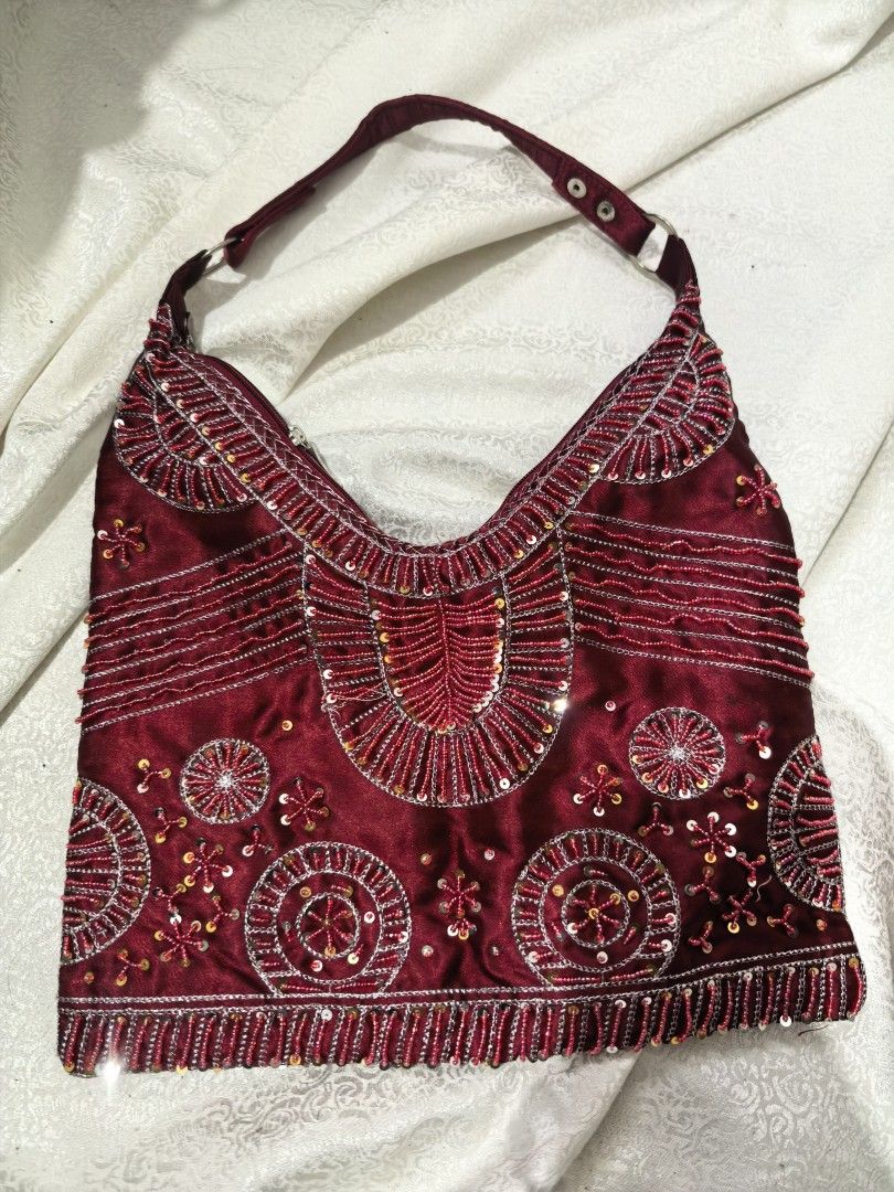 Red Beaded Shoulder Bag (Category: Shoulder Bags) located in Tuguegarao City. Submitted by zenphoenix-7ad615 (Listing ID 1452587561, Image 2). Description: Beaded Shoulder bag 12 by 11 inches.