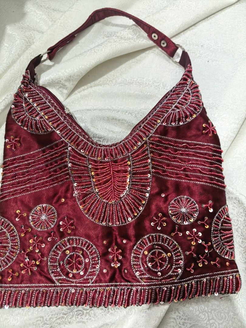 Red Beaded Shoulder Bag (Category: Shoulder Bags) located in Tuguegarao City. Submitted by zenphoenix-7ad615 (Listing ID 1452587561, Image 1). Description: Beaded Shoulder bag 12 by 11 inches.