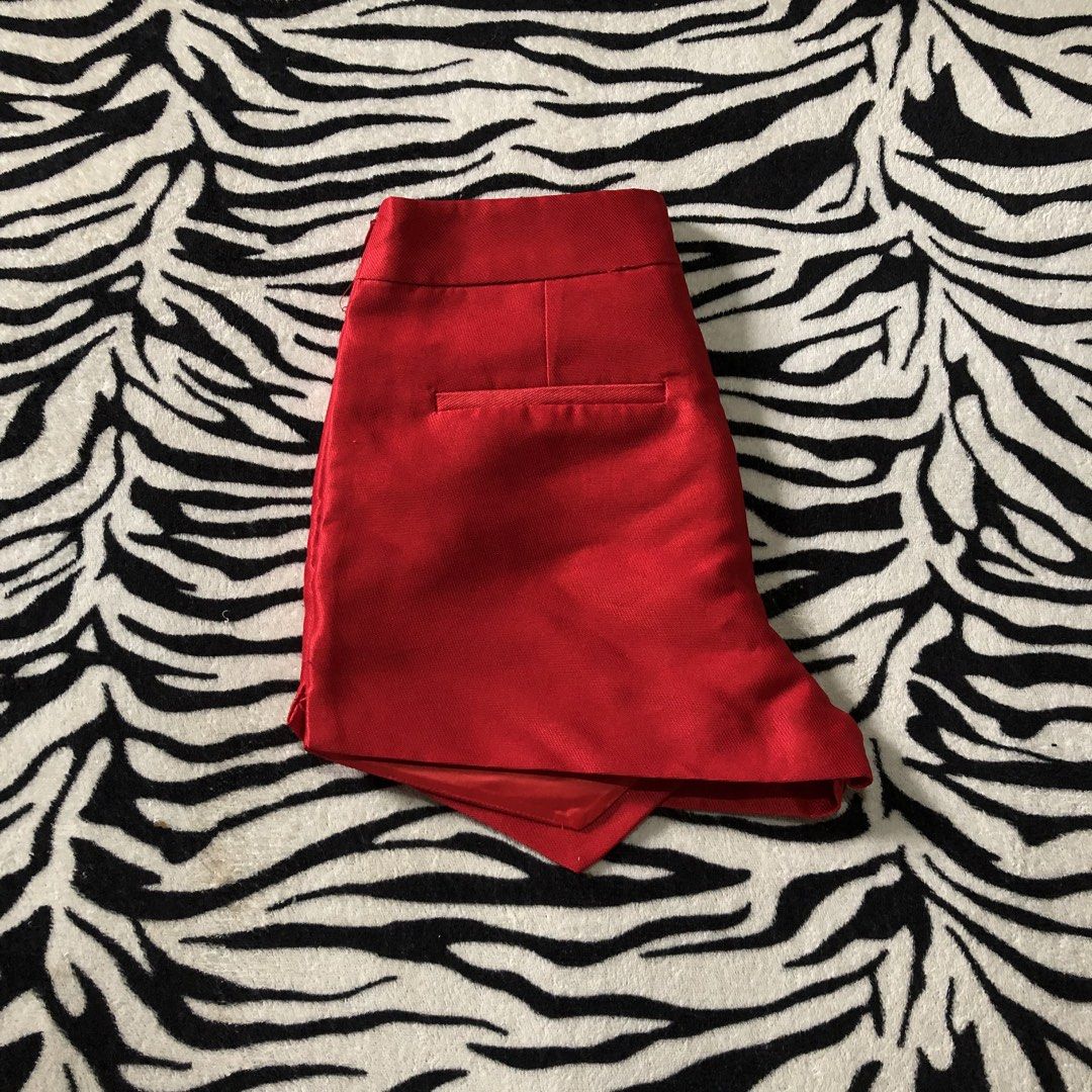Red Satin Wrap Skort (Category: Skirts) located in Muntinlupa City. Submitted by ksclocollection (Listing ID 1452572467, Image 2). Description: Cute red skort with satin finish and wrap-around front. Perfect for parties or nights out. Comfortable, stylish, and easy to pair. waist 25-26.