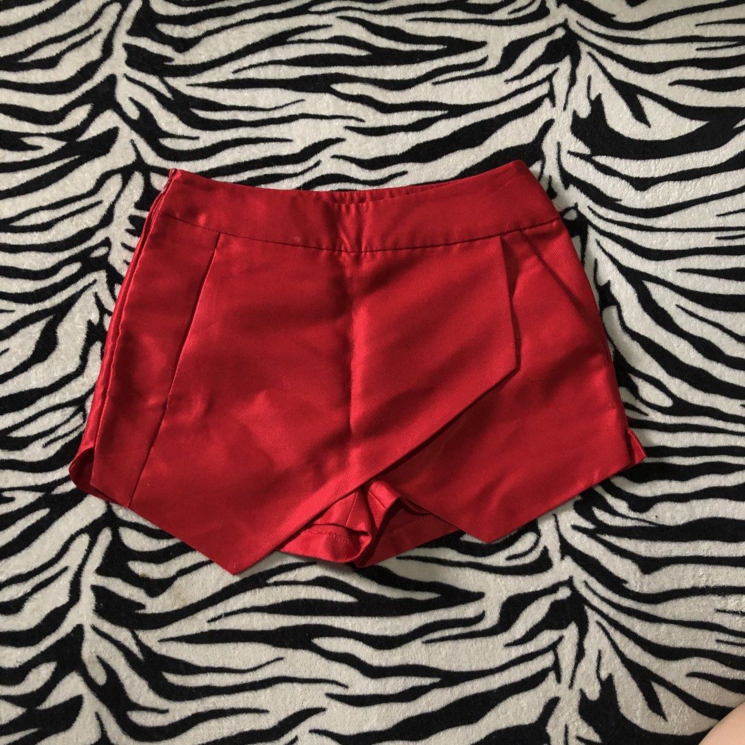 Red Satin Wrap Skort (Category: Skirts) located in Muntinlupa City. Submitted by ksclocollection (Listing ID 1452572467, Image 3). Description: Cute red skort with satin finish and wrap-around front. Perfect for parties or nights out. Comfortable, stylish, and easy to pair. waist 25-26.
