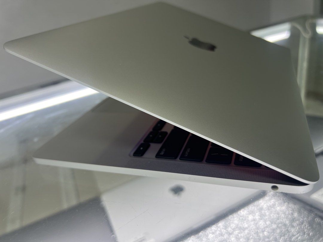 Rush for sale ‼️MacBook pro 2020 13” (Category: Laptops & Notebooks) located in Manila. Submitted by vaniextura (Listing ID 1452568849, Image 3). Description: Rush for sale ‼️MacBook pro 2020 13inch Chip apple M1 Memory 16gb Storage 512gb Silver Very clean No issues or dents No history repairs All good working All good condition Very smooth Very smooth track pad and performance Good for use school and work Pakage original charger Free pouch Free 