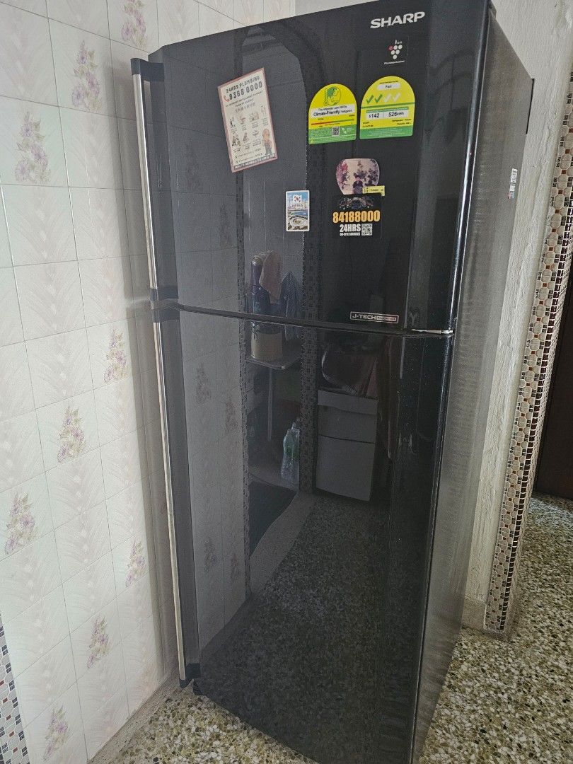 Sharp Refrigerator (Category: Refrigerators & Freezers) located in Singapore. Submitted by collabb (Listing ID 1452551272, Image 1). Description: - Sharp Double-Door Refrigerator - Colour: Black - Energy Efficient: 4-Tick Rating - Technology: J-Tech Inverter - Features: Spacious interior, keeps food fresh - Contact for more information.