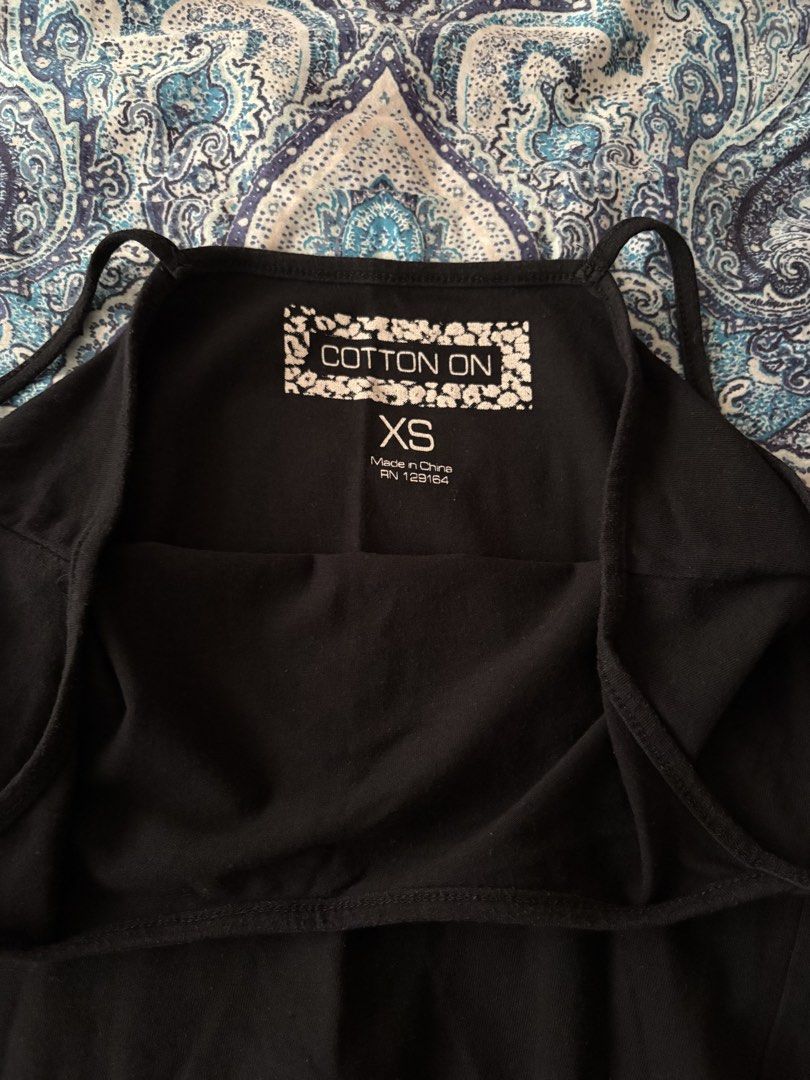 singlets (Category: Sleeveless) located in Singapore. Submitted by bluegiraffes (Listing ID 1452594196, Image 3). Description: all have been used a few times but no flaws :) $2 each or $5 for all 3. all fit XS-S 1. black singlet, more of a racerback design! 2. cotton on black singlet tagged XS but can fit up to S too! 3. blue singlet only self collection or mailing for items under $5! tags singlet tank top sleeveless layering layer black blue dar