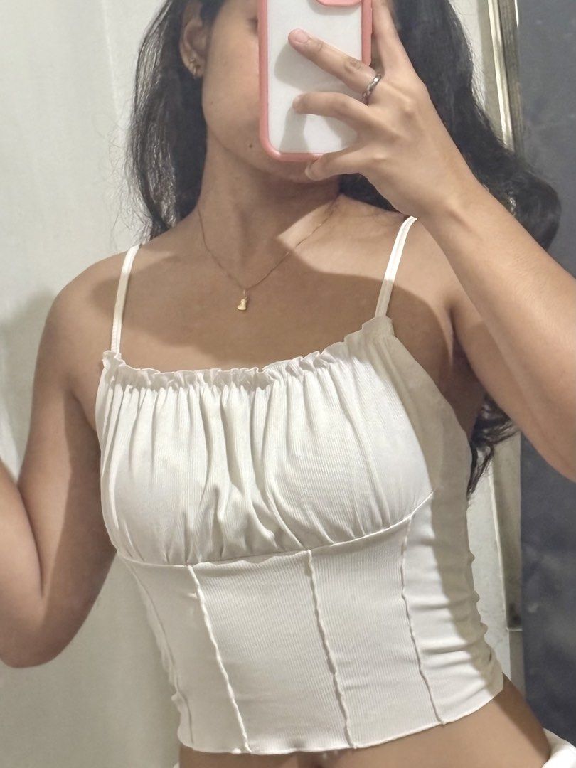 Soft Corset Crop top (Category: Sleeveless) located in Santa Rita. Submitted by joniii.shop (Listing ID 1452582711, Image 3). Description: Preloved clothes looking for a new home. 🤍 Slightly used and still in great condition, has a minimal stain at the back ^^.