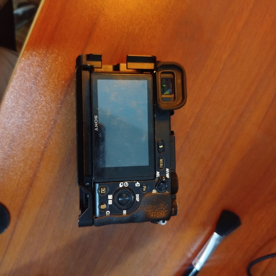 Sony Alpha a6500 Mirrorless Camera with SmallRig Cage (Category: Cameras) located in Caloocan City. Submitted by cachero_kai (Listing ID 1452683700, Image 3). Description: - Sony Alpha a6500 Mirrorless Camera - Includes SmallRig cage for enhanced grip and mounting - Attached wooden grip for comfortable handling - Compatible with Sony E-mount lenses - Ideal for vlogging and photography - Ready for your next creative project 38k SC 1 Battery SD car