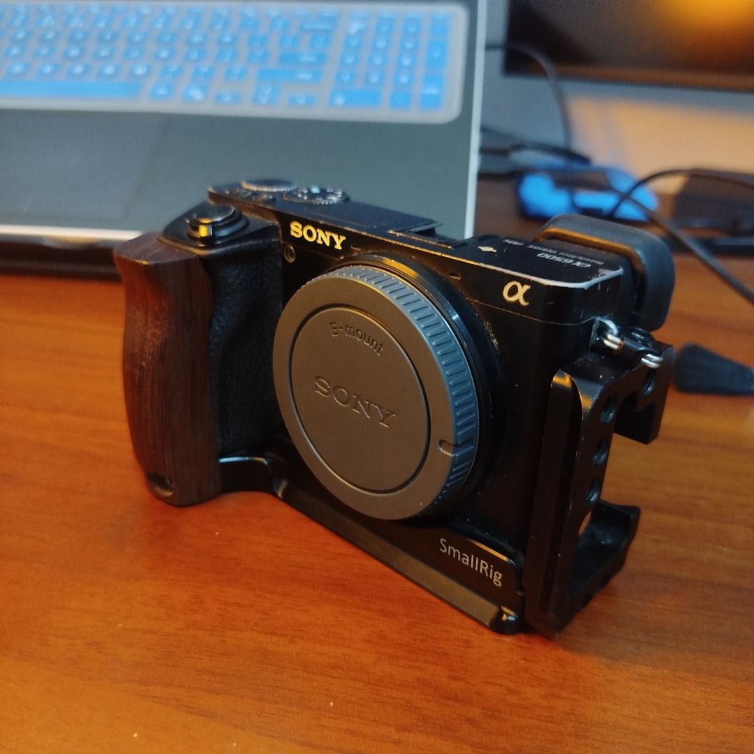 Sony Alpha a6500 Mirrorless Camera with SmallRig Cage (Category: Cameras) located in Caloocan City. Submitted by cachero_kai (Listing ID 1452683700, Image 1). Description: - Sony Alpha a6500 Mirrorless Camera - Includes SmallRig cage for enhanced grip and mounting - Attached wooden grip for comfortable handling - Compatible with Sony E-mount lenses - Ideal for vlogging and photography - Ready for your next creative project 38k SC 1 Battery SD car