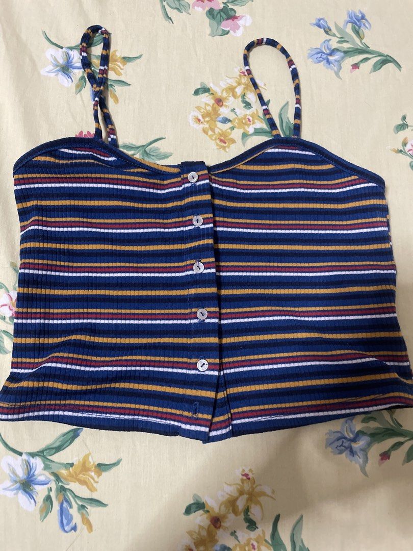 Ribbed Striped Button-Up Crop Top (Category: Others Tops) located in Manila. Submitted by sapsari (Listing ID 1452680928, Image 1). Description: - project social urban outfitters Los Angeles - medium on tag but best fit for xs and petite. - button-up front and thin straps - Ribbed texture fabric - used once. - flaw: missing last button.