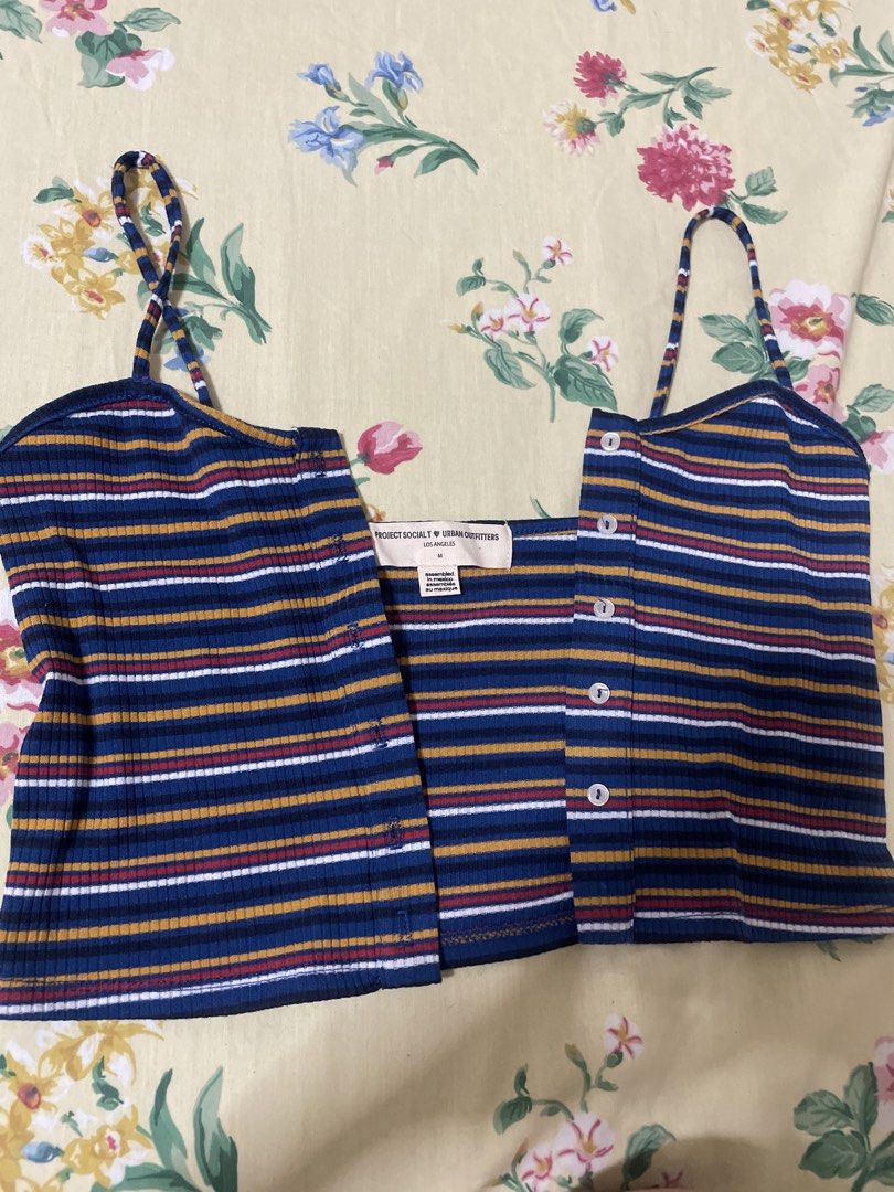 Ribbed Striped Button-Up Crop Top (Category: Others Tops) located in Manila. Submitted by sapsari (Listing ID 1452680928, Image 2). Description: - project social urban outfitters Los Angeles - medium on tag but best fit for xs and petite. - button-up front and thin straps - Ribbed texture fabric - used once. - flaw: missing last button.