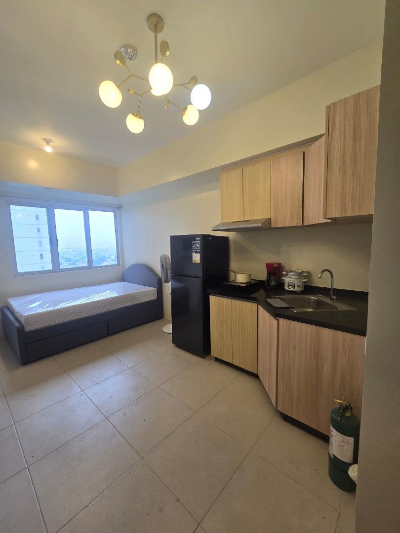 Studio unit for rent (Category: Apartments & Condos) located in Quezon City. Submitted by jb0516 (Listing ID 1452600553, Image 2). Description: Avida Sola studio unit furnished 1 year stay renewable 1 month adv, 2 months deposit with pdc's Near solaire, vertis north, trinoma and mrt station.