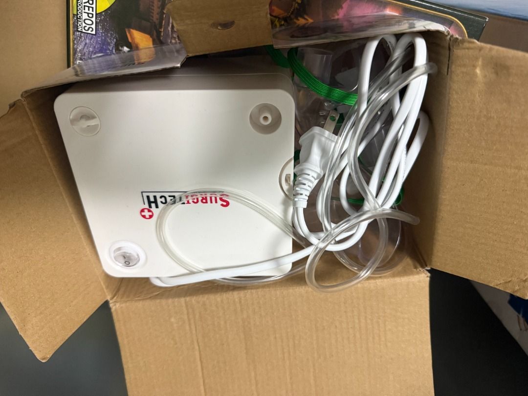 SURGITECH Mini Nebulizer with Complete Accessories (Category: Medical Supplies & Tools) located in Quezon City. Submitted by sabbeewabee (Listing ID 1452590611, Image 1). Description: USED ONCE ONLY - Surgitech Mini Nebulizer - Complete accessories included.