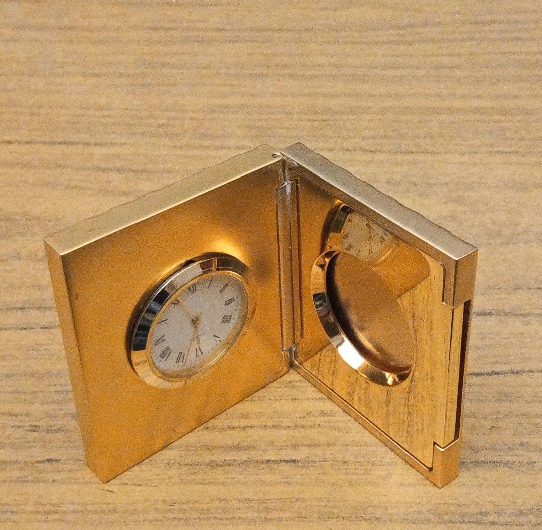 Table top clock (Category: Accessories) located in Kuala Lumpur. Submitted by live.alex68 (Listing ID 1452666596, Image 1). Description: Exclusive Table Top Clock in heavy gold plated brass enclosure. Will make a nice gift. .