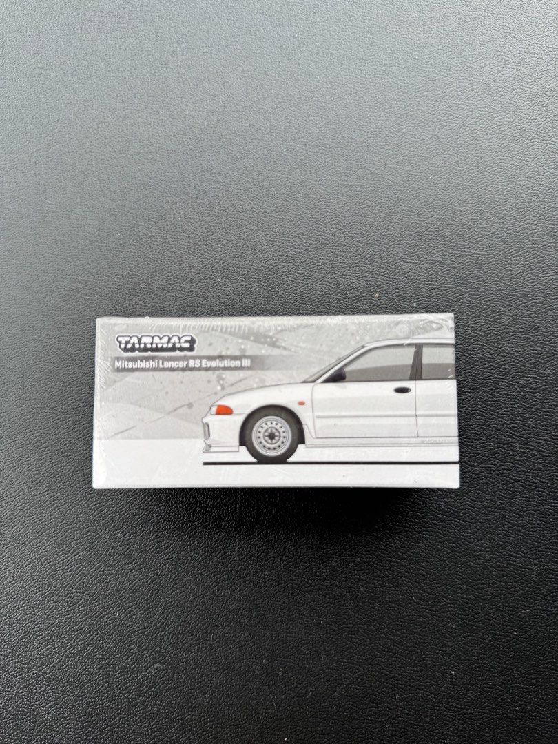 Tarmac Mitsubishi Lancer RS Evolution III (Category: Vehicle & Diecast Models) located in Manila. Submitted by altan16 (Listing ID 1452525671, Image 1). Description: Sealed.