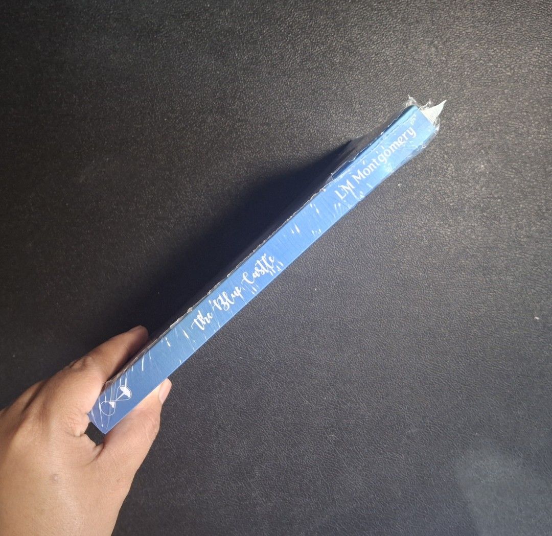 THE BLUE CASTLE by Lucy Maud Montgomery (Category: Storybooks) located in Borongan. Submitted by murabooks (Listing ID 1452574213, Image 2). Description: Like new, unused condition. Please check my other book listings. For inquiries, feel free to message me. Happy reading!! The Blue Castle is a novel about Valancy Stirling, a 29-year-old woman who lives a repressed life under the control of her overbearing family. After receiving a diagnosis of a