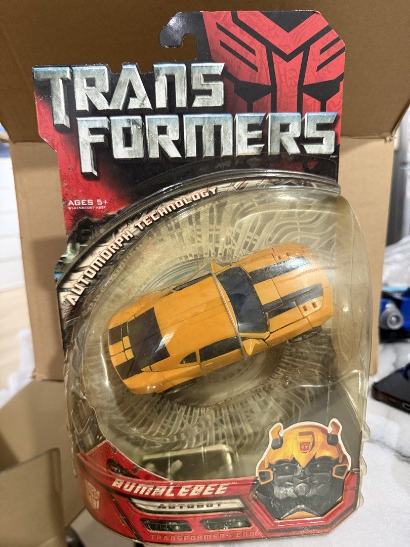 Transformers Bumblebee (Category: Toy Figures) located in Singapore. Submitted by silver_vintagecollector (Listing ID 1452620653, Image 1). Description: - Transformers Bumblebee action figure - Iconic yellow Autobot design - Brand new, sealed in original packaging - Perfect for Transformers collectors and fans - Features classic Bumblebee detailing.