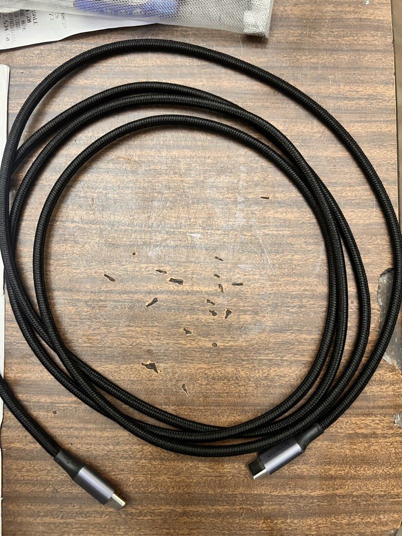 UGREEN fast charging cable (Category: Chargers) located in Manila. Submitted by dolce__j (Listing ID 1452641889, Image 2). Description: - Brand: UGREEN - Type: USB-C to USB-C Fast Charging Cable - Length: 6.6ft (2.0m) - Durability: High-density braiding, tested for 10,000+ plug & unplug cycles - Features: Rugged and durable, crack & wear resistant, Safe Charging with E-Marker chip (auto-detects current) - Compatibility: Laptops, Tablets, Phones R