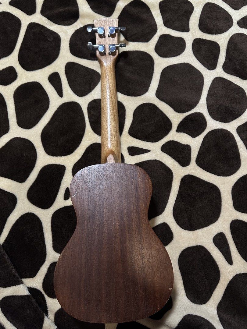 Ukulele (Category: Musical Instruments) located in Valenzuela. Submitted by nicadahhh (Listing ID 1452682956, Image 3). Description: - Brown wooden ukulele - Four strings and a bridge - Tuning pegs on the headstock -tune and play rfs. di na ginagamit, declutter lang gamit.