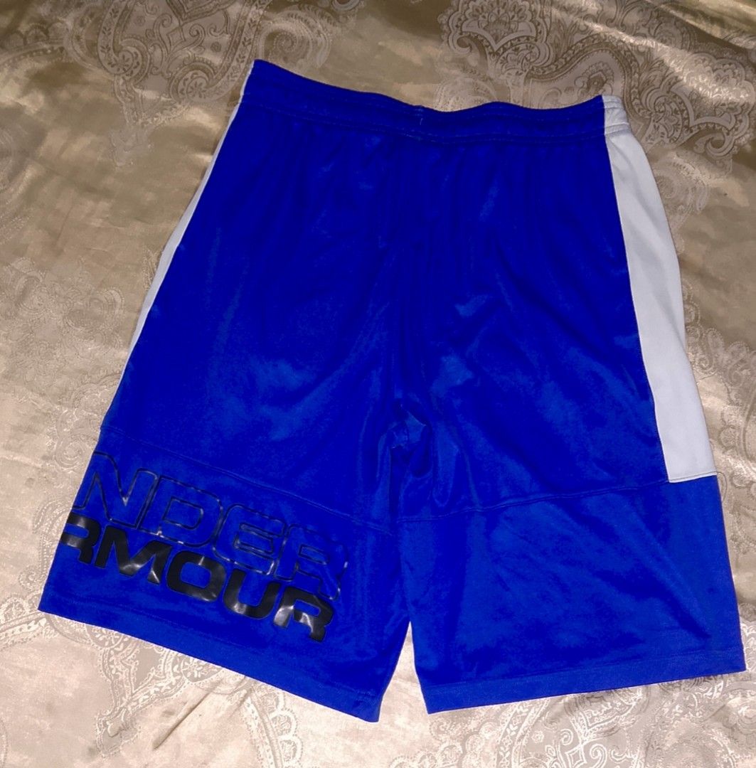 Under Armour Royal Blue Athletic Shorts YXL (Category: Shorts) located in Bago City. Submitted by champsthrift. (Listing ID 1452561981, Image 2). Description: - Brand: Under Armour - Color: Royal Blue with White Side Panels - Material: HeatGear - Features: Under Armour logo on leg - Size: Youth XL (YXL) - Ideal for: Sports, training, or casual wear.