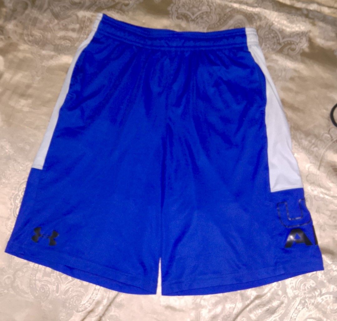 Under Armour Royal Blue Athletic Shorts YXL (Category: Shorts) located in Bago City. Submitted by champsthrift. (Listing ID 1452561981, Image 1). Description: - Brand: Under Armour - Color: Royal Blue with White Side Panels - Material: HeatGear - Features: Under Armour logo on leg - Size: Youth XL (YXL) - Ideal for: Sports, training, or casual wear.