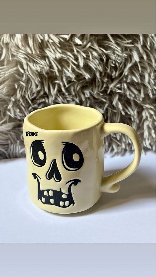 Unique Ceramic Mugs with Colorful Handles (Category: Coffee & Tea Tableware) located in Manila. Submitted by jcv.25 (Listing ID 1452541515, Image 3). Description: - Set of unique ceramic mugs - Fun and quirky designs - Available handle colors: red, plain yellow, skeleton face, blue, tan - Ideal for morning coffee or tea - Great for gifting or adding personality to your kitchen ₱120 each 2 for ₱230.