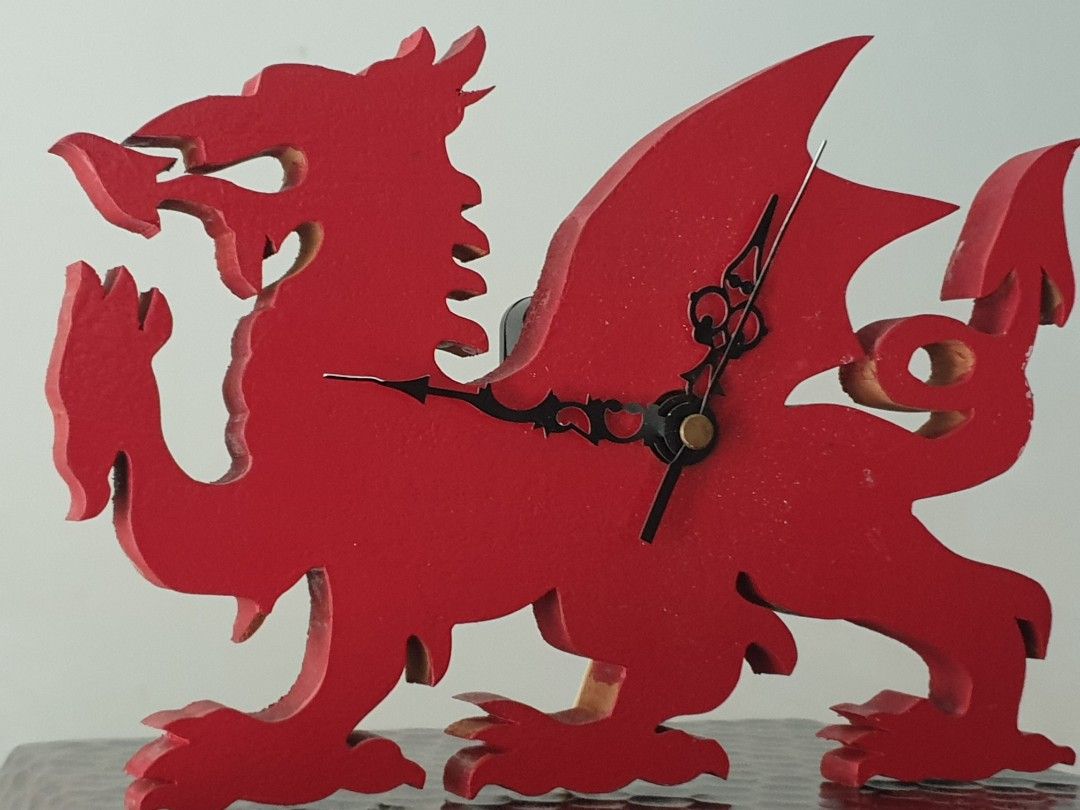 Unique Welsh Dragon Clock Wooden Wall Hang (Category: Wall Decor) located in Las Pinas. Submitted by oldsthetics (Listing ID 1452628564, Image 3). Description: Unique Welsh Dragon Clock Wooden Wall Hang Great accent and mancave piece See photo for size This is a used item Working condition Preloved and not new May have imperfections Typical of age and usage bearable chip (see photo) Open type - hands are exposed causing some to bend Overall: work