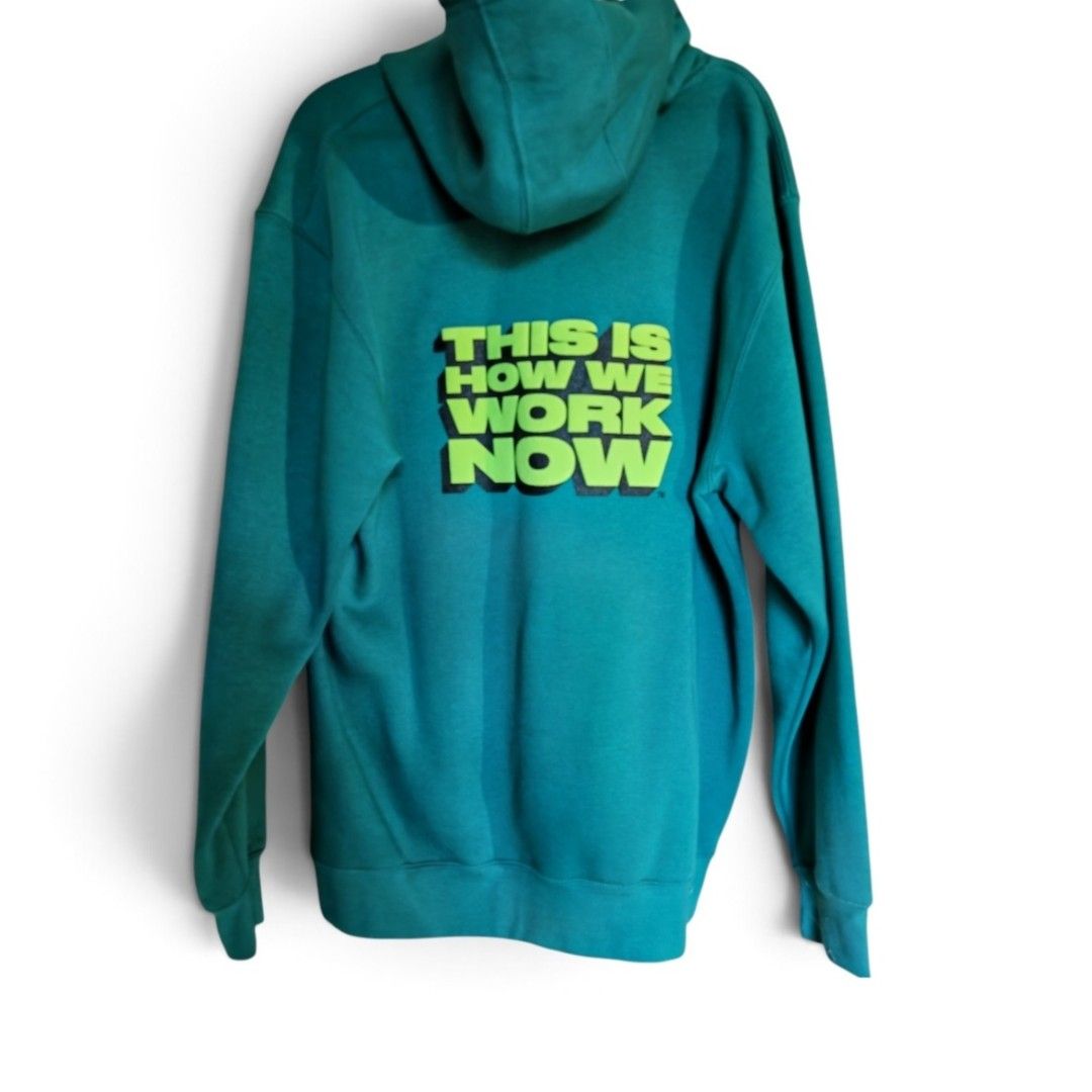 Upwork "This Is How We Work Now" Green Hoodie (Category: Hoodies) located in Manila. Submitted by xraverx (Listing ID 1452544290, Image 2). Description: - Green hoodie with Upwork logo on the front. - Rare hoodie for Upworkers. - Back graphic: "THIS IS HOW WE WORK NOW". - Brand: Lane Seven Apparel. - Material: Soft and comfortable. - Perfect for casual wear or representing your freelance hustle. -Runs Large size. Can fit L to XL.