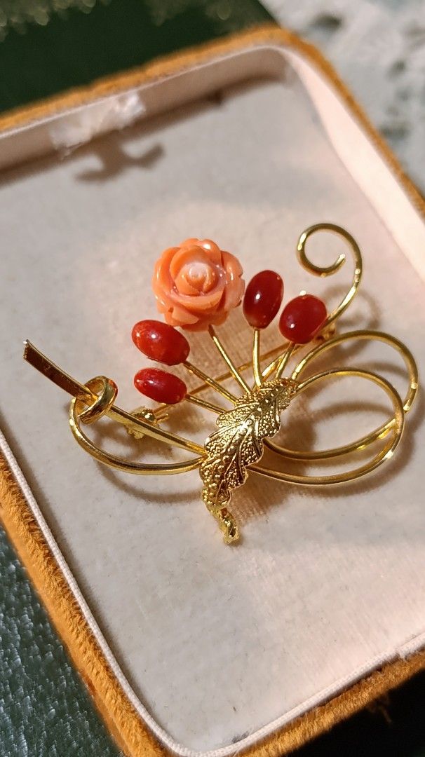 Vintage Coral Brooch (Category: Brooches) located in Gingoog City. Submitted by ThePurpleBox (Listing ID 1452607800, Image 2). Description: Vintage Coral Brooch 2,280php✅ This beautiful gold-tone brooch features an intricately carved rose angel skin coral blooming alongside polished scarlet cabochons and a delicate textured leaf. In very good used condition. Disclaimer: Listed items are vintage/pre-owned, which means they had a life before we fou