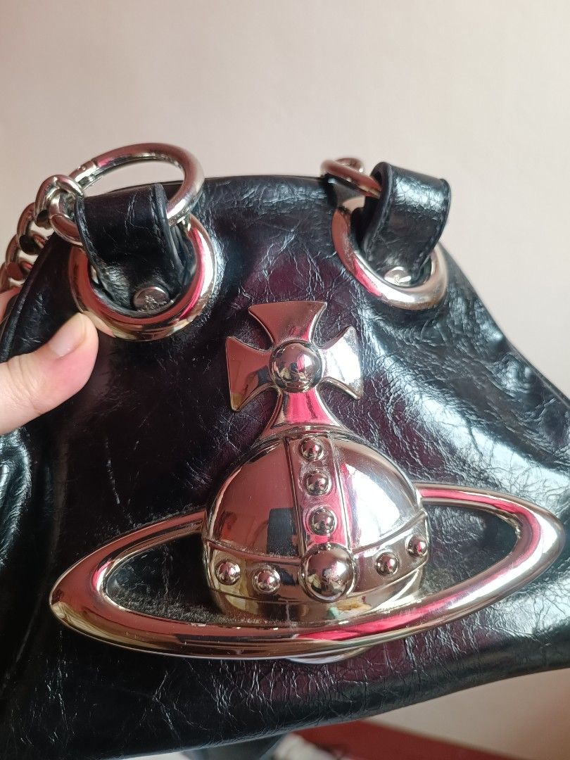 Vivienne Westwood archive orb bag (Category: Luxury Bags & Wallets) located in Paranaque City. Submitted by earlylux (Listing ID 1452595254, Image 3). Description: First photo for reference only Please inspect photos for signs of usage/flaw No inclusions! Normal signs of usage please manage your expectations you're buying a secondhand bag. Self authentication is advised Pm for more details No return, no refund, no exchange, no cancellation! First