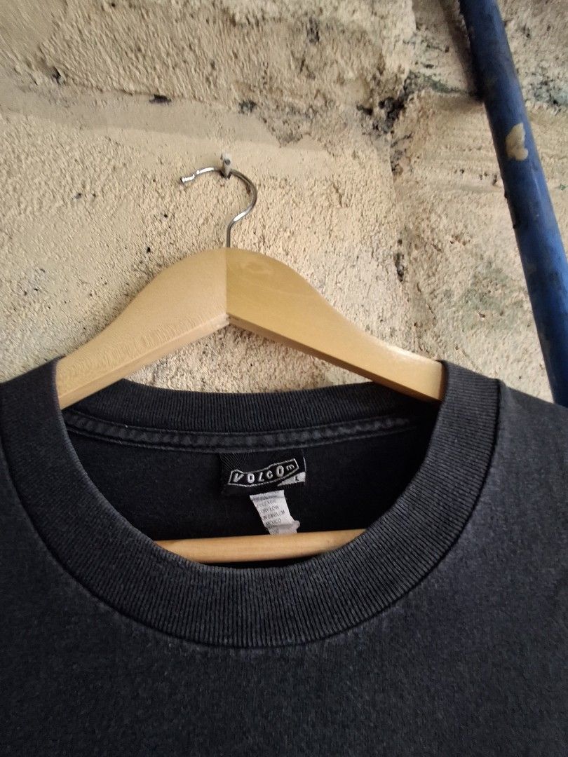 Volcom T-Shirt Black with Logo (Category: Activewear) located in Quezon City. Submitted by Thriftallthetime (Listing ID 1452579677, Image 3). Description: - Classic black Volcom t-shirt - Features the signature Volcom stone logo on the front - Made from comfortable cotton material - Ideal for casual everyday wear - Size clearly indicated on the tag.