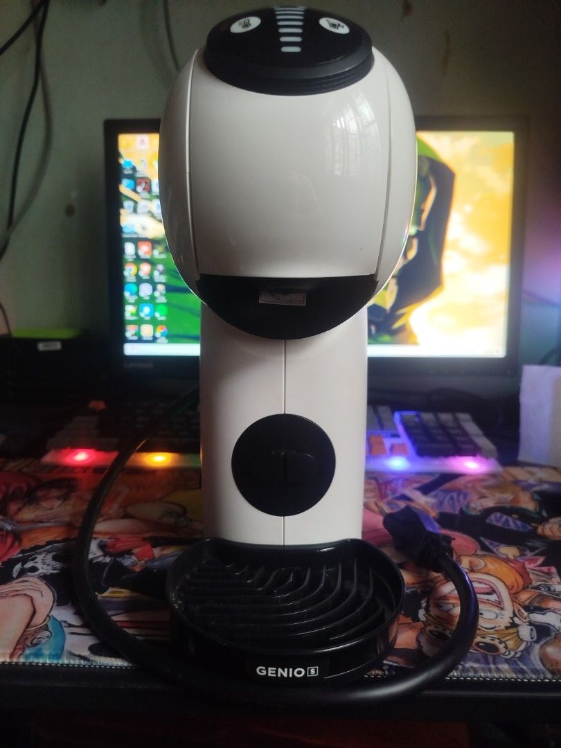 White Nescafé Dolce Gusto Genio S Coffee Machine (Category: Coffee Machines & Makers) located in Caloocan City. Submitted by geo20 (Listing ID 1452553162, Image 3). Description: - White Nescafé Dolce Gusto Genio S coffee machine - Compact design, perfect for any kitchen counter - Brews delicious coffee using convenient pods - Clear water tank for easy monitoring of water level - Adjustable drip tray for different cup sizes - Power cord included.