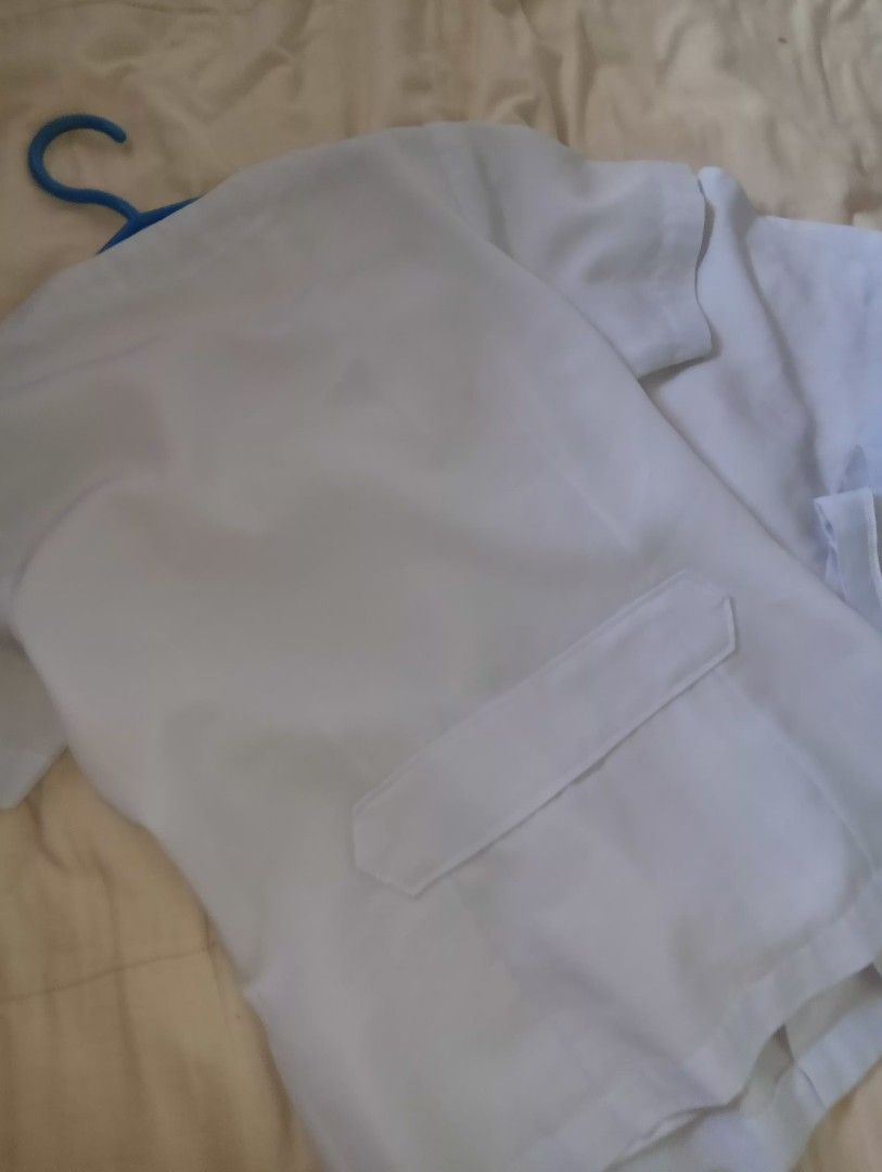 White Nurse/Medical Student Uniform Set (Category: Sets or Coordinates) located in Muntinlupa City. Submitted by cjcalcifier (Listing ID 1452510051, Image 3). Description: - White uniform set suitable for OLFU 1st-2nd year uniform Medtech - Top features convenient snap button closure. - Pants have a secure zipper and button closure. - Embellished with a green emblem on the chest. - Estimated size: Small to Medium. - Perfect for clinical duties an