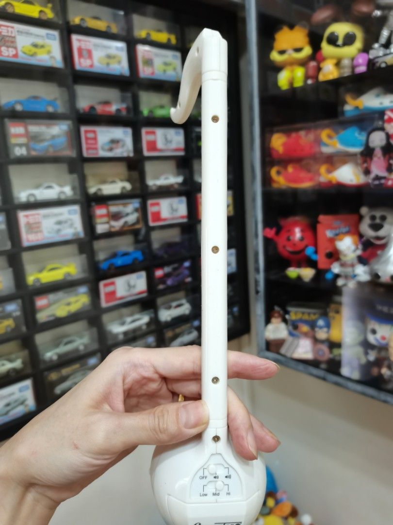 White Otamatone Electronic Musical Instrument (Category: Musical Instruments) located in Pasig City. Submitted by kurt_jess05-73494 (Listing ID 1452518445, Image 2). Description: - White Otamatone electronic musical instrument - Fun and unique sound creation - Settings: Off, Low, Mid, - Ideal for music enthusiasts and collectors Bought in Japan .