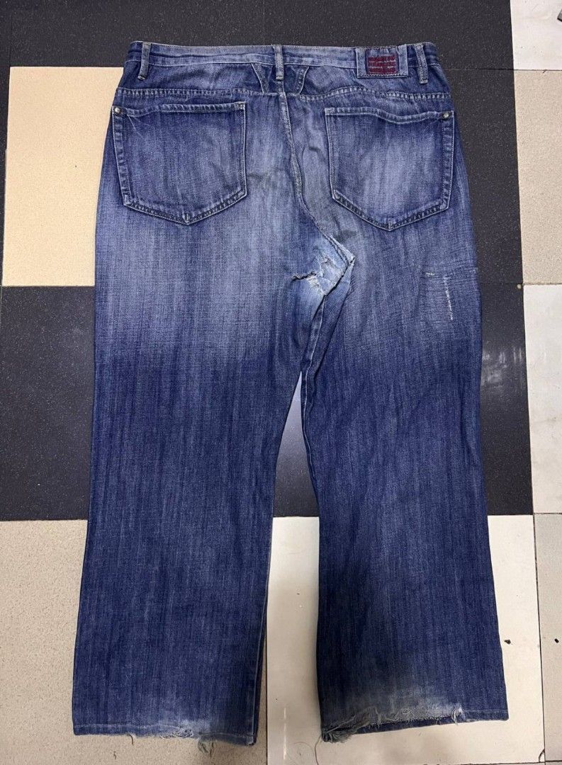 Y2k Marithe Francois Girbaud Denim Jeans (Category: Jeans) located in Caloocan City. Submitted by Tulokss (Listing ID 1452686018, Image 2). Description: - Classic Marithe Francois Girbaud denim jeans - Blue wash - baggy fit - Unique distressed details on knees and hem - Ideal for casual wear - Please check photos for specific wear details.