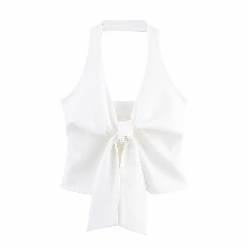 Zara White Vest Halter Neck Bow Front Crop Top (Category: Sleeveless) located in Manila. Submitted by declutter_with_m3 (Listing ID 1452571373, Image 1). Description: Vest top with bow in front Literally used this once Rfs: decluttering and just too long for my torso but love it sana MoP: Gcash/BPI.