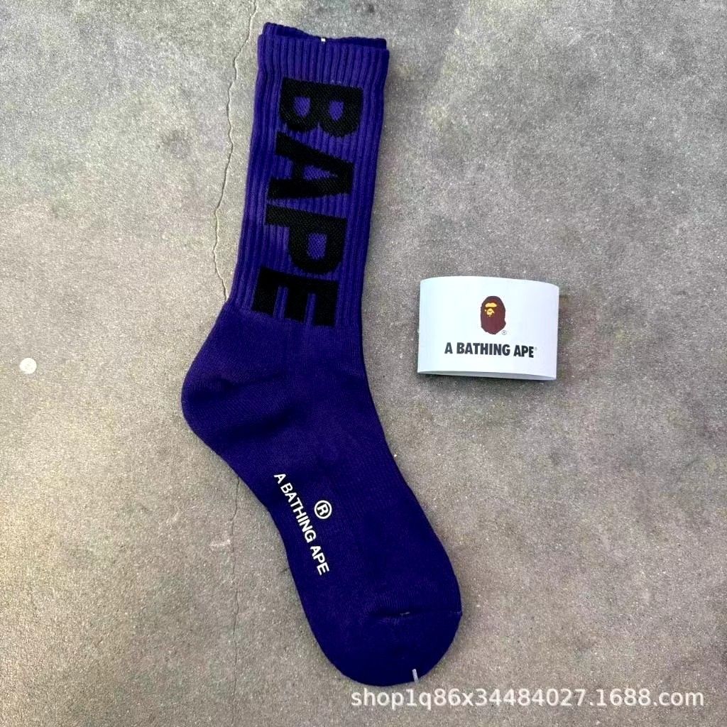 A Bathing Ape BAPE Socks (Set of 4) (Category: Socks) located in Manila. Submitted by the3rdcee01 (Listing ID 1447424161, Image 3). Description: - Set of 4 A Bathing Ape (BAPE) socks - Includes black, white, purple, and red pairs - Features the iconic BAPE logo - Ideal for streetwear fashion - All socks come with original tags and packaging.