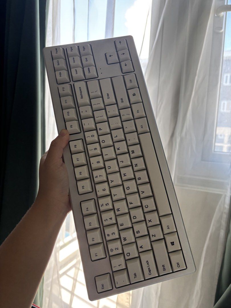 ABKONCORE AR87 Mechanical Silver Aluminum Keyboard (Category: Computer Keyboard) located in Marikina City. Submitted by decuidyi (Listing ID 1447353941, Image 3). Description: - ABKONCORE AR87 Mechanical Keyboard - Authentic Cherry MX Switches - High-Performance 1000Hz Report Rate - Premium Silver Aluminum Body - Includes Protective Carrying Case and Box - Ideal for Gaming and Typing - Tested and Fully Functional Other info: - This keyboard is no