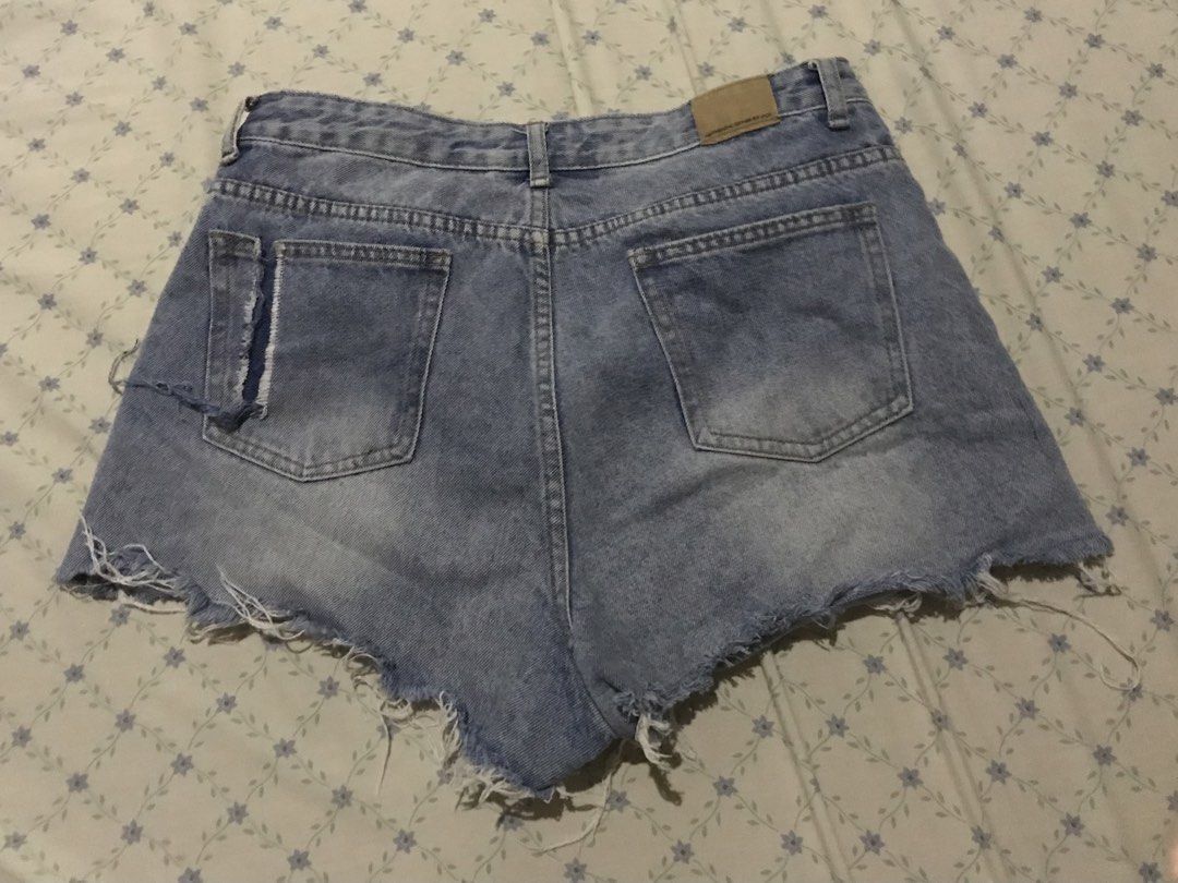ACT.3 Denim High Waisted Ripped Shorts (Category: Shorts) located in Manila. Submitted by sparkfinds (Listing ID 1447425362, Image 2). Description: - Light wash denim shorts - High-waisted fit - Frayed hem detail - Distressed accents on back pocket and front hem - Classic five-pocket styling - Button and zip closure.