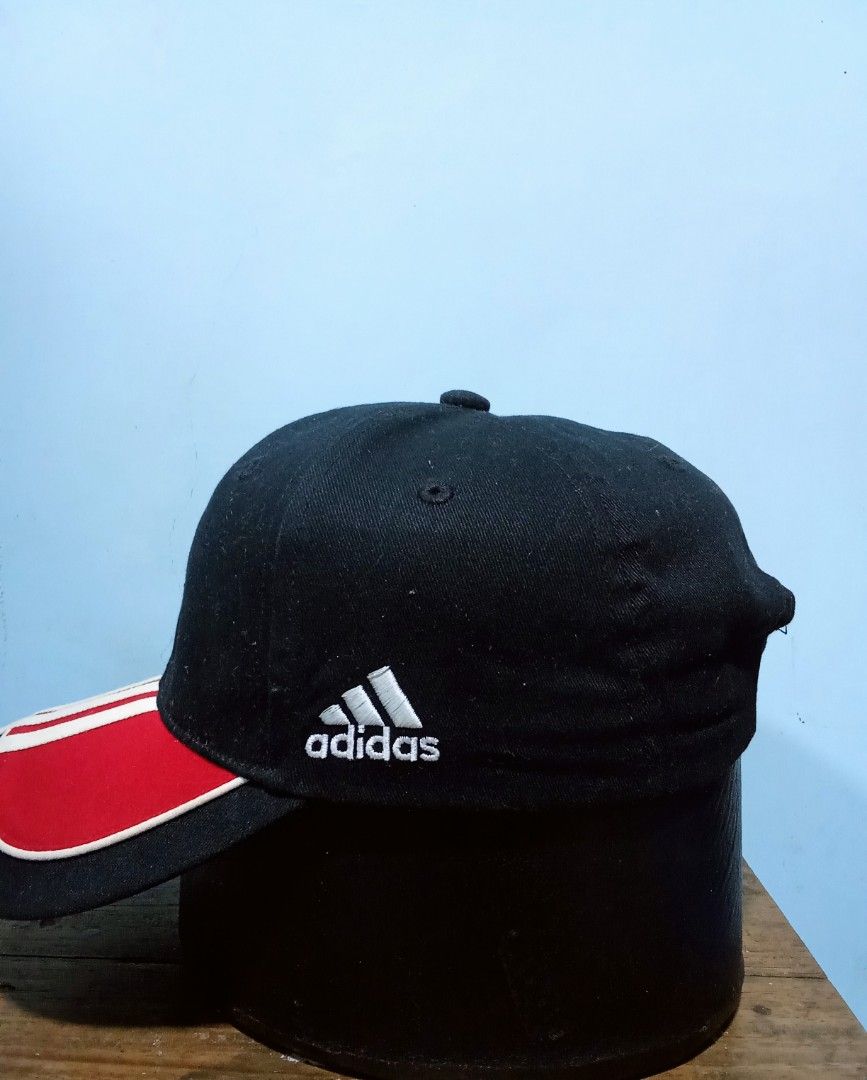 Adidas Cap Black Red White 3-Stripes (Category: Caps & Hats) located in Pagsanjan. Submitted by tomsupply (Listing ID 1447355615, Image 3). Description: - Classic Adidas cap - Iconic red and white 3-stripes on the brim - Embroidered Adidas logo on the side - Adjustable strap for a comfortable fit - Ideal for everyday style and sun protection.