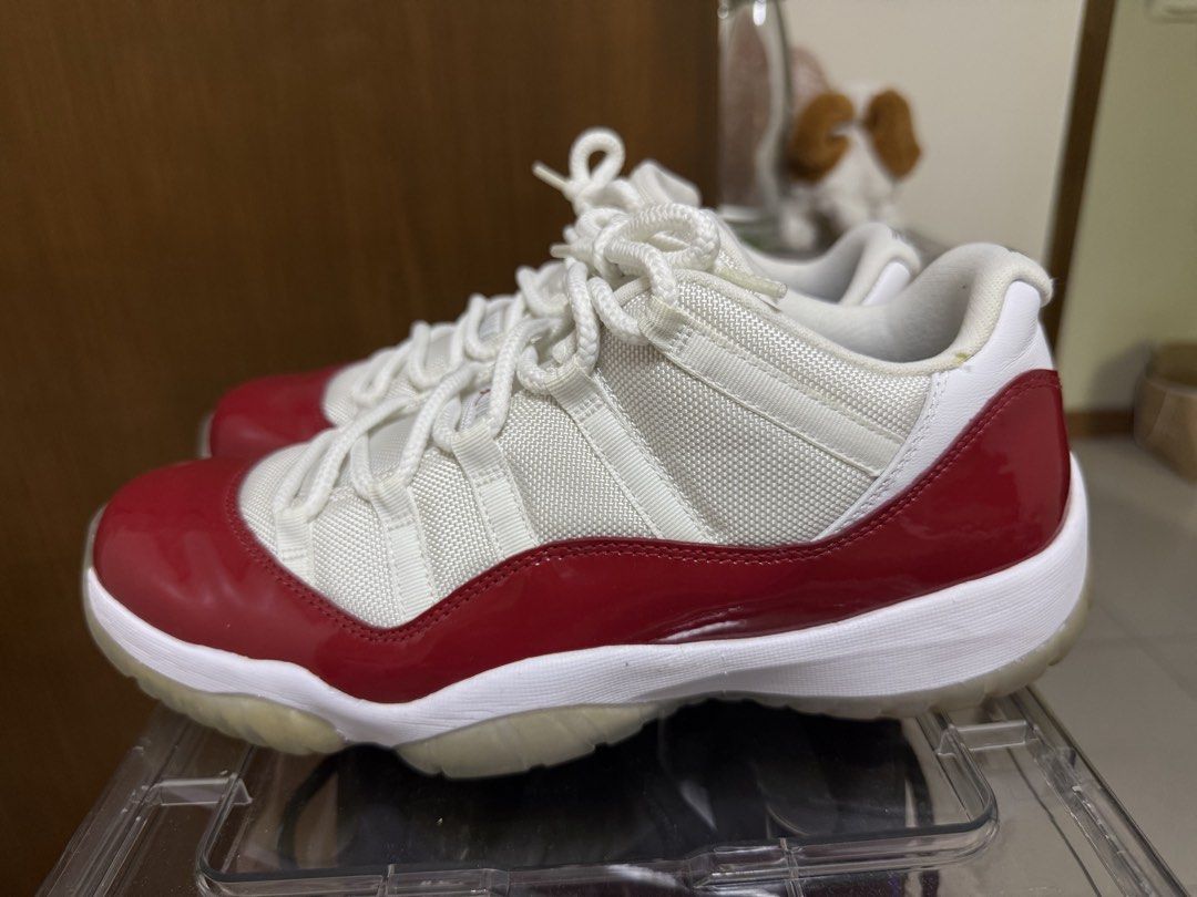 Air Jordan 11 Retro Low "Cherry" (Category: Casual Shoes) located in Lubao. Submitted by sofi97204 (Listing ID 1447433989, Image 2). Description: Air Jordan 11 Retro Low "Cherry" (ORIGINAL!!) Colorway: Red & White (Cherry) Condition: 9.5/10 (worn once or twice) Issue: may konting bakbak sa foam part (see pic) Size: US 11/UK 10/EU 45/CM 29 NO BOX NEGOTIABLE!! PM FOR MORE DETAILS! shipping fee shoulder ng buyer can do shipping and meet ups (around 