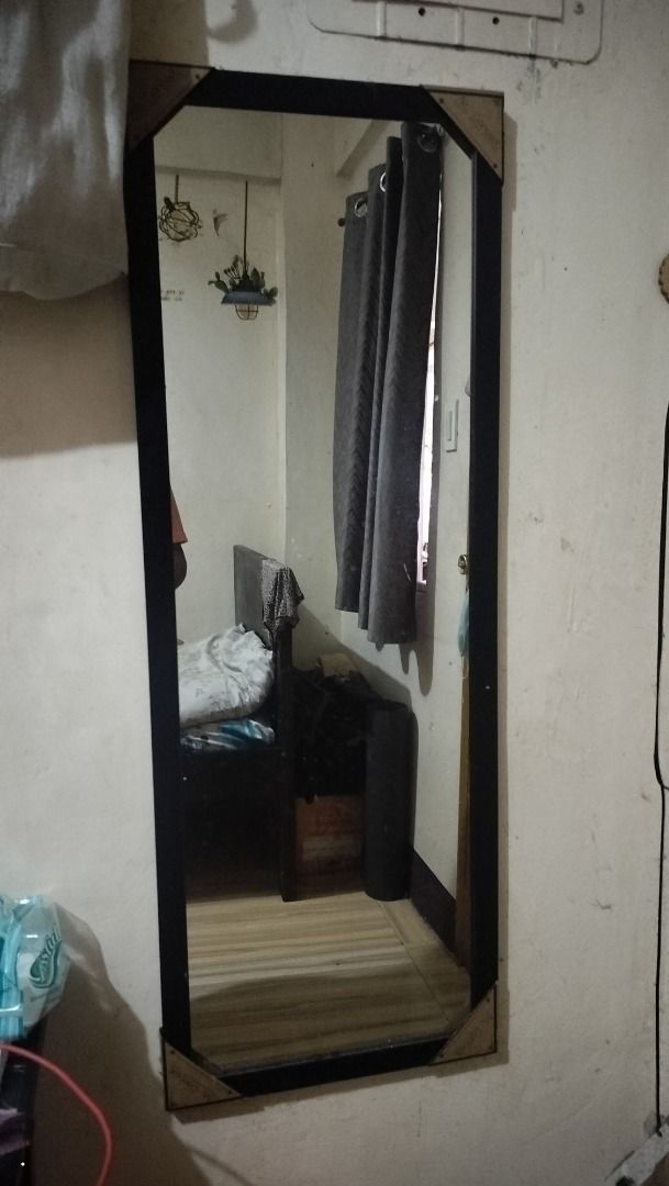 Art Concept Full Length Mirror Black Frame (Category: Mirrors) located in Las Pinas. Submitted by fastpenguin.adb9e1 (Listing ID 1447372988, Image 1). Description: - Full length mirror - Black frame with decorative corner accents - Approximately 4 feet tall - Versatile: can be hung on a wall or leaned - Perfect for outfit checks - Negotiable .