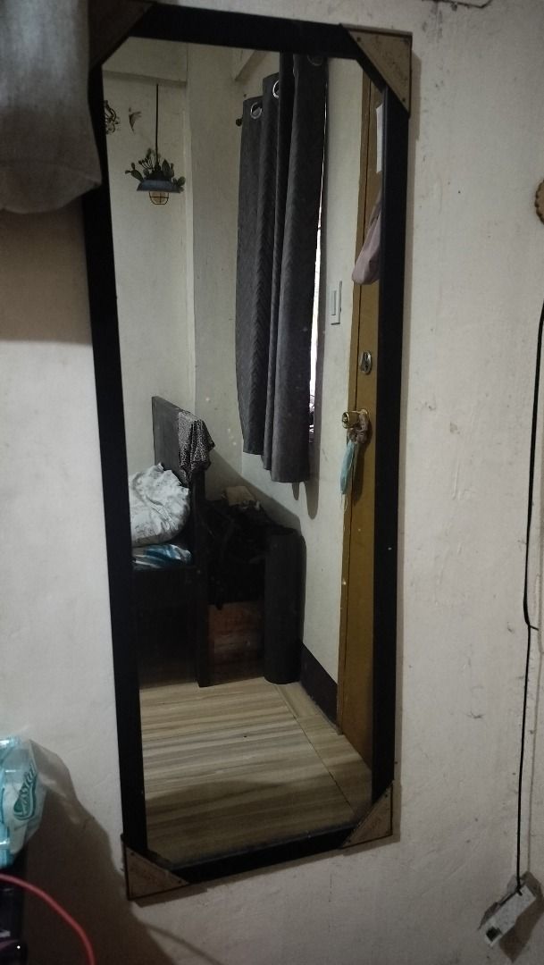 Art Concept Full Length Mirror Black Frame (Category: Mirrors) located in Las Pinas. Submitted by fastpenguin.adb9e1 (Listing ID 1447372988, Image 3). Description: - Full length mirror - Black frame with decorative corner accents - Approximately 4 feet tall - Versatile: can be hung on a wall or leaned - Perfect for outfit checks - Negotiable .