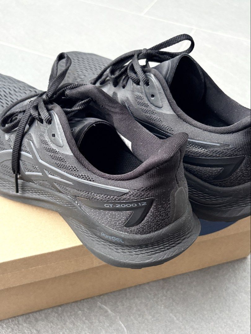 ASICS RUNNING SHOES GT-2000 12 (Category: Sneakers) located in Bacolod City. Submitted by madnomad (Listing ID 1447318242, Image 3). Description: Asics GT-2000 12 Running Shoes All black Used once Gifted RFS: decluttering.