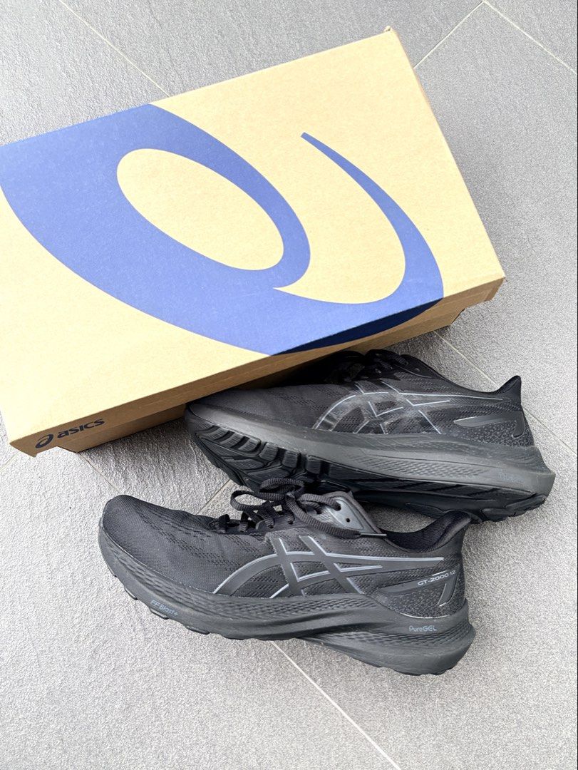 ASICS RUNNING SHOES GT-2000 12 (Category: Sneakers) located in Bacolod City. Submitted by madnomad (Listing ID 1447318242, Image 2). Description: Asics GT-2000 12 Running Shoes All black Used once Gifted RFS: decluttering.