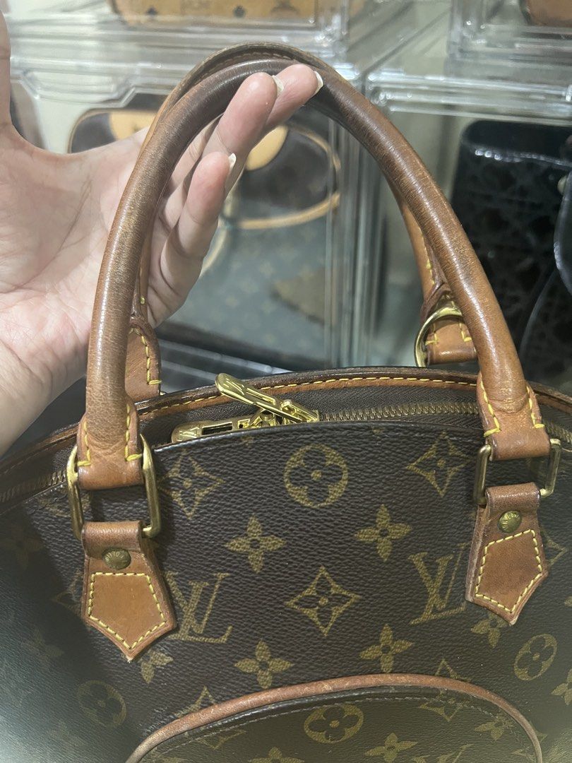 Authentic Louis Vuitton Monogram Ellipse MM Handbag (Category: Luxury Bags & Wallets) located in Manila. Submitted by sanyatagle08878 (Listing ID 1447307651, Image 2). Description: - Guaranteed Original Classic Louis Vuitton monogram canvas handbag - Features the iconic LV pattern - Leather handles show some signs of wear - Zipper closure - Comes with dust bag, lock, and keys - A timeless piece for your collection RFS: Bag Upgrade slightly negoti
