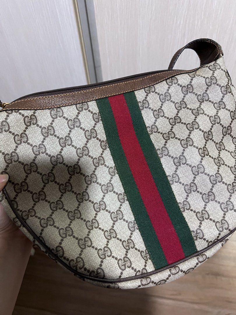 Authentic Vintage Gucci Sherry Line Shoulder Bag (Category: Luxury Bags & Wallets) located in Manila. Submitted by ot7purple (Listing ID 1447426346, Image 2). Description: -Negotiable for as long as its not a lowball offer ❤️ - 100% Authentic - Vintage Gucci shoulder bag comes with dust bag - Structure all good, zipper working, no fading on the bag, no crack on the strap and is adjustable - A bit of dusty on the inside but manageable - Vintage, t