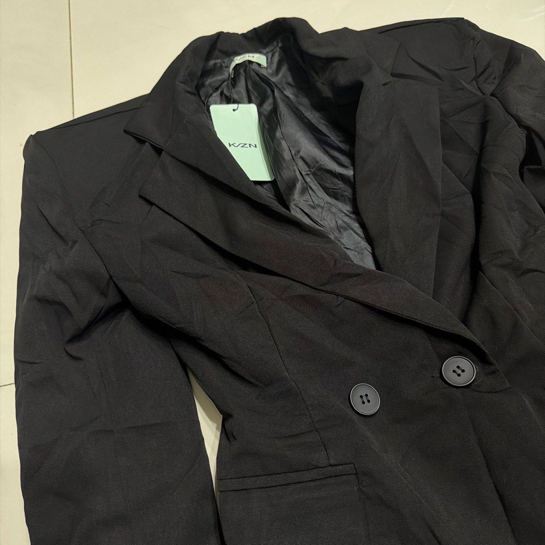Black Double-Breasted Blazer Suit Dress (Category: Coats, Jackets and Outerwear) located in Cavite. Submitted by gccwardrobe (Listing ID 1447363172, Image 2). Description: - K/ZN Black Blazer - Double-breasted style with two buttons - Features front pockets - Fully lined interior - Perfect for dressing up or down - Ideal for work or a night out.